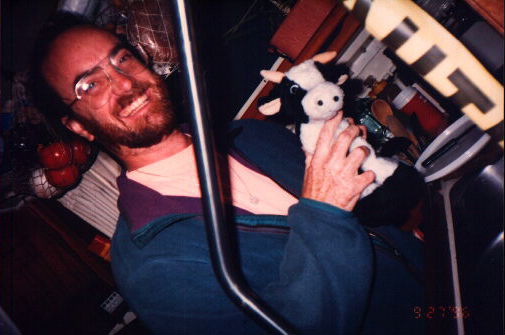 Rick holding 20 cm. stuffed cow
